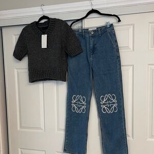 Black Knit Sweater and Blue Jeans with White Embroidery